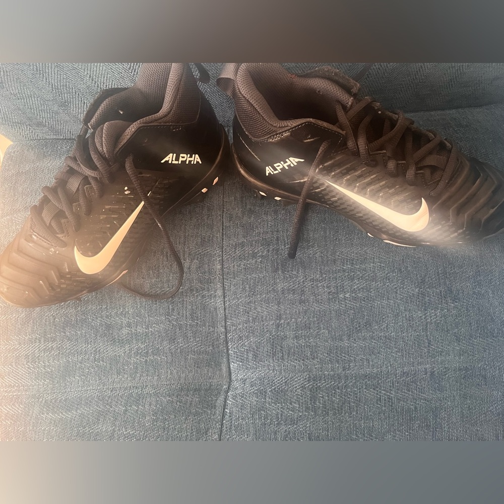 Brand new 4y football cleats